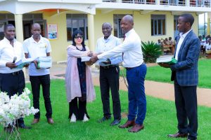 Staff of the Confucious class at Luyanzi institute donating books at ECS